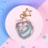 Glittrig bag charm - Capricorn cake