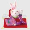 Vinkande kanin med lila kimono